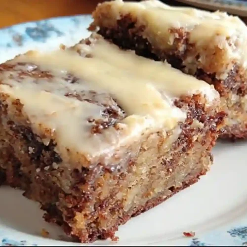 Delicious banana bread brownies with chocolate drizzle and banana slices