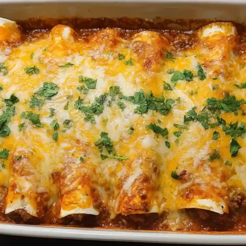 Delicious easy ground beef enchiladas ready to be served
