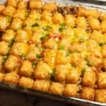 Delicious Tater Tot Casserole served in a baking dish with golden tater tots on top.
