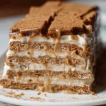 No-bake cookie butter icebox cake with Speculoos cookies on a plate