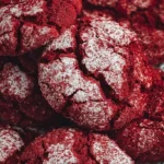Red Velvet Cake Cookies decorated with cream cheese frosting and sprinkles